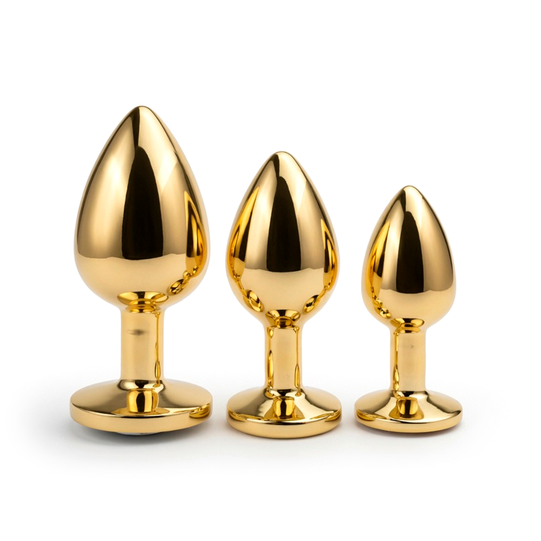 Plug anal dorado con joya
