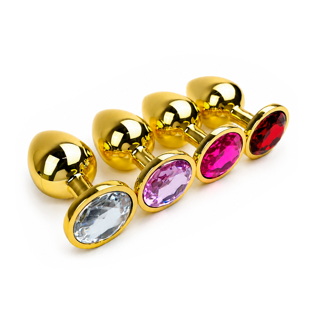 Plug anal dorado con joya