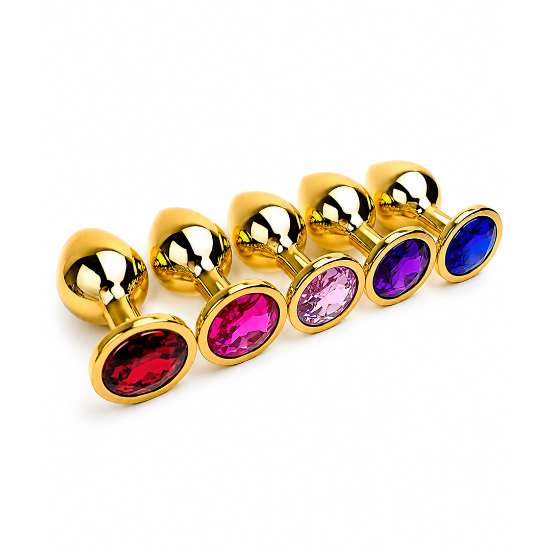 Plug anal dorado con joya